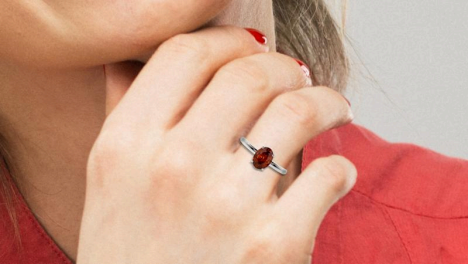 silver ring with amethyst february birthstone ring by gemsny on woman's finger