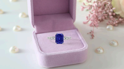 silver ring with tanzanite december birthstone ring by gemsny displayed in a pink ring box
